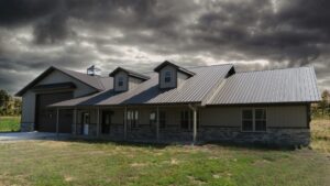 Metal Roof with Metal Batten Siding and Stone