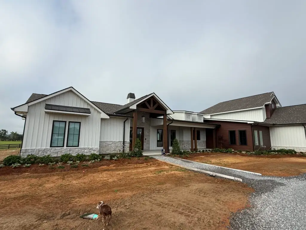 Textured Alamo White metal siding with timber entry porch in Bogalusa, Louisiana