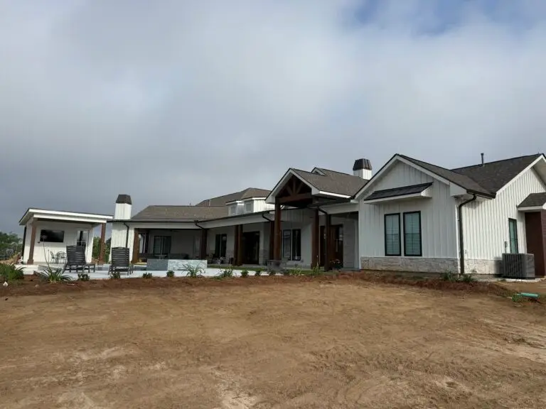 Rural Louisiana metal siding home with covered patio and outdoor living space